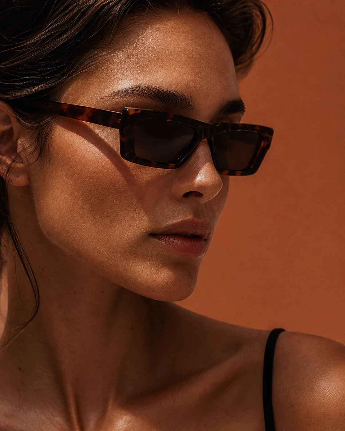Close editorial view of dark tortoiseshell sunglasses